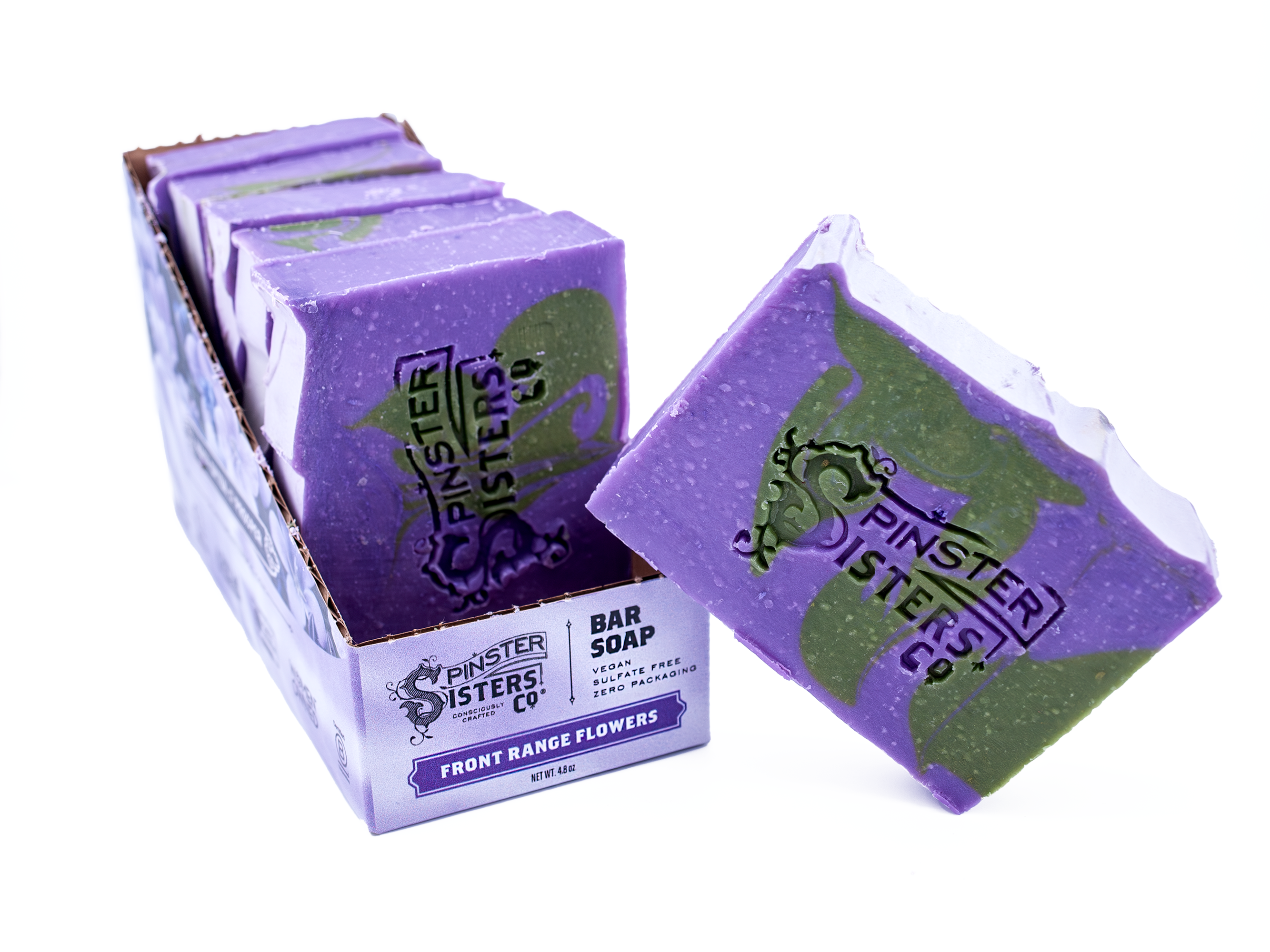 Case of Front Range Flower Purple bar soap with green design and 'Spinster Sisters' branding, displayed with packaging.