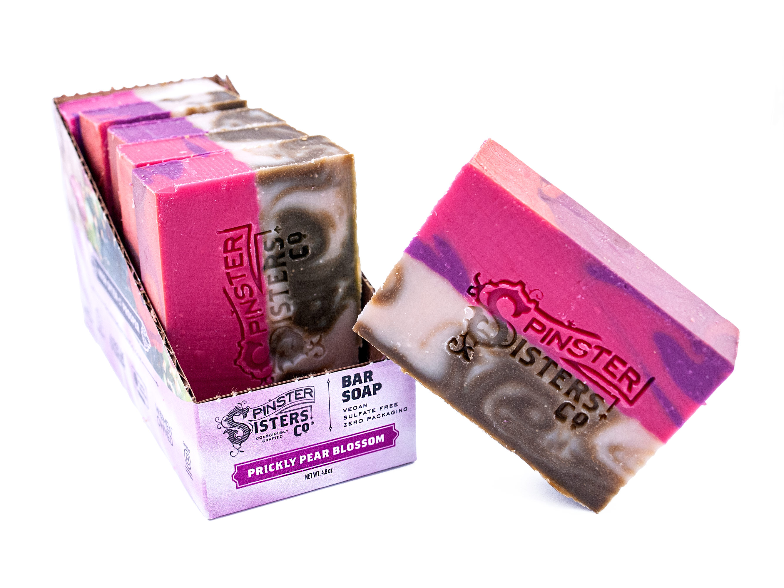 Case of Prickly Pear Blossom swirled soap bars with 'Spinster Sisters Co' branding on a white background