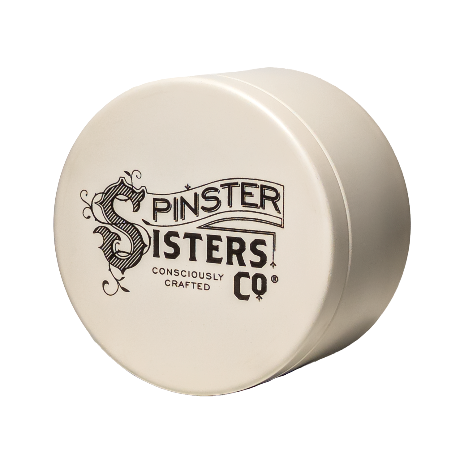 'Spinster Sisters Co Consciously Crafted' Etched on a cream colored travel tin