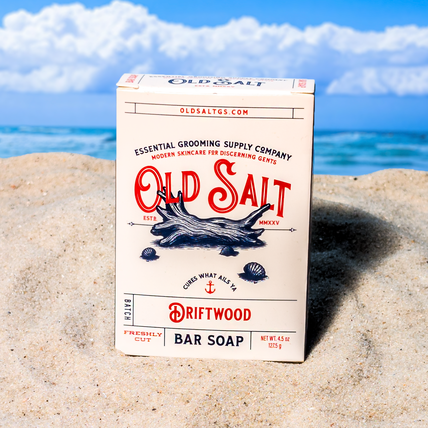 Box of Old Salt Driftwood Bar Soap on a Sandy beach