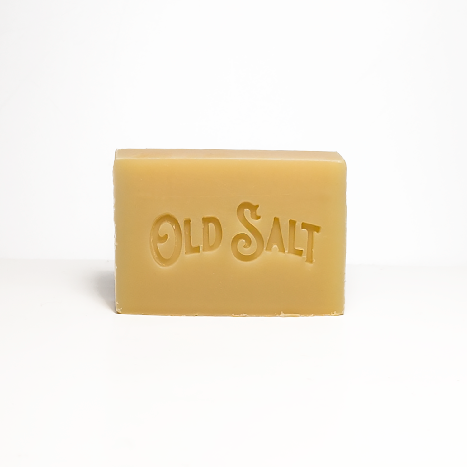 Bar of Oakmoss & Amber soap with 'Old Salt' branding on a white background
