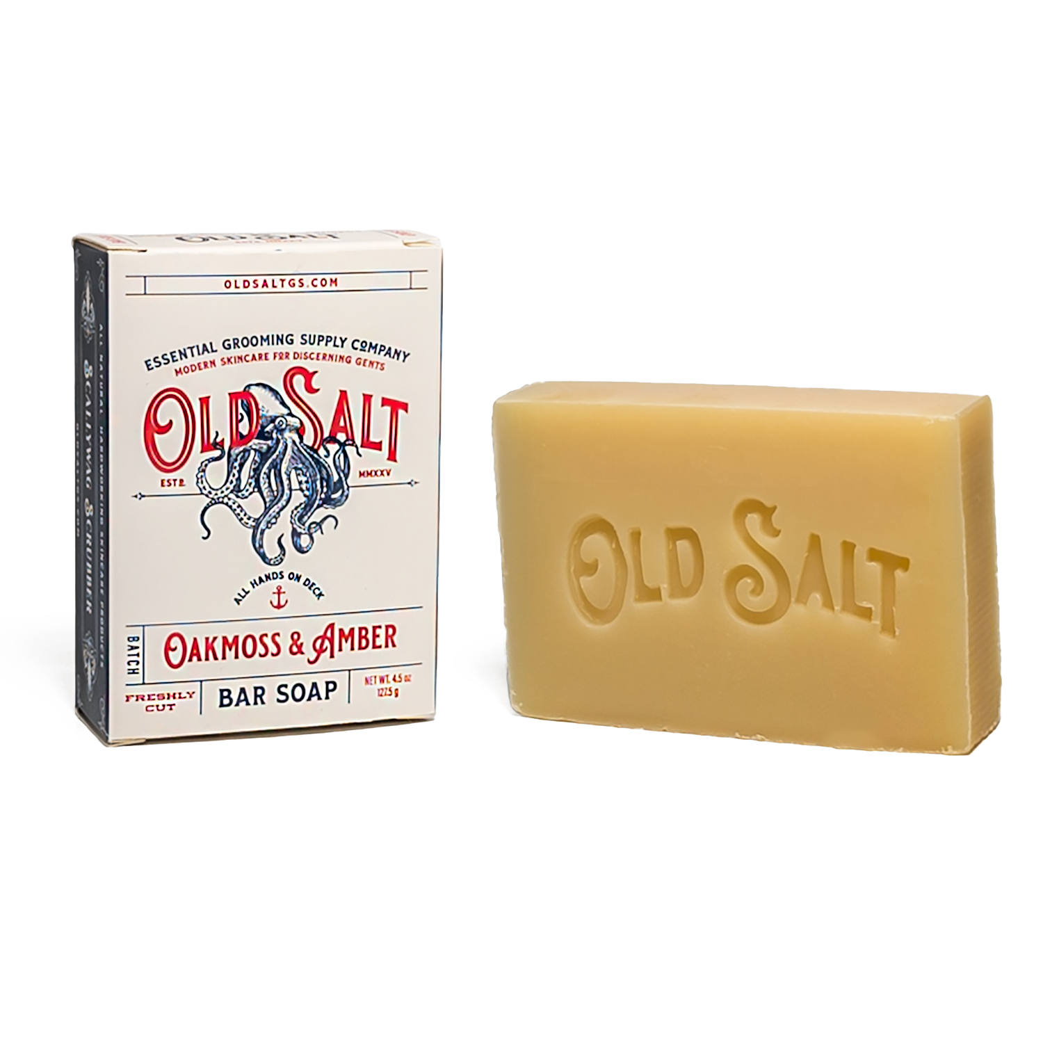 Bar of Oakmoss & Amber Old Salt soap next to its packaging on a white background