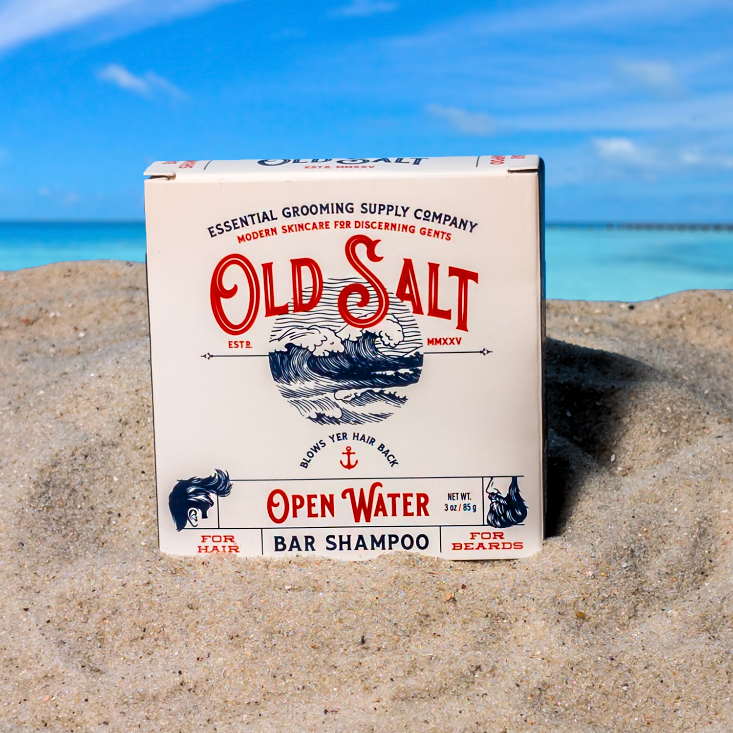 Box of Old Salt Open Water Shampoo Bar on a Sandy beach