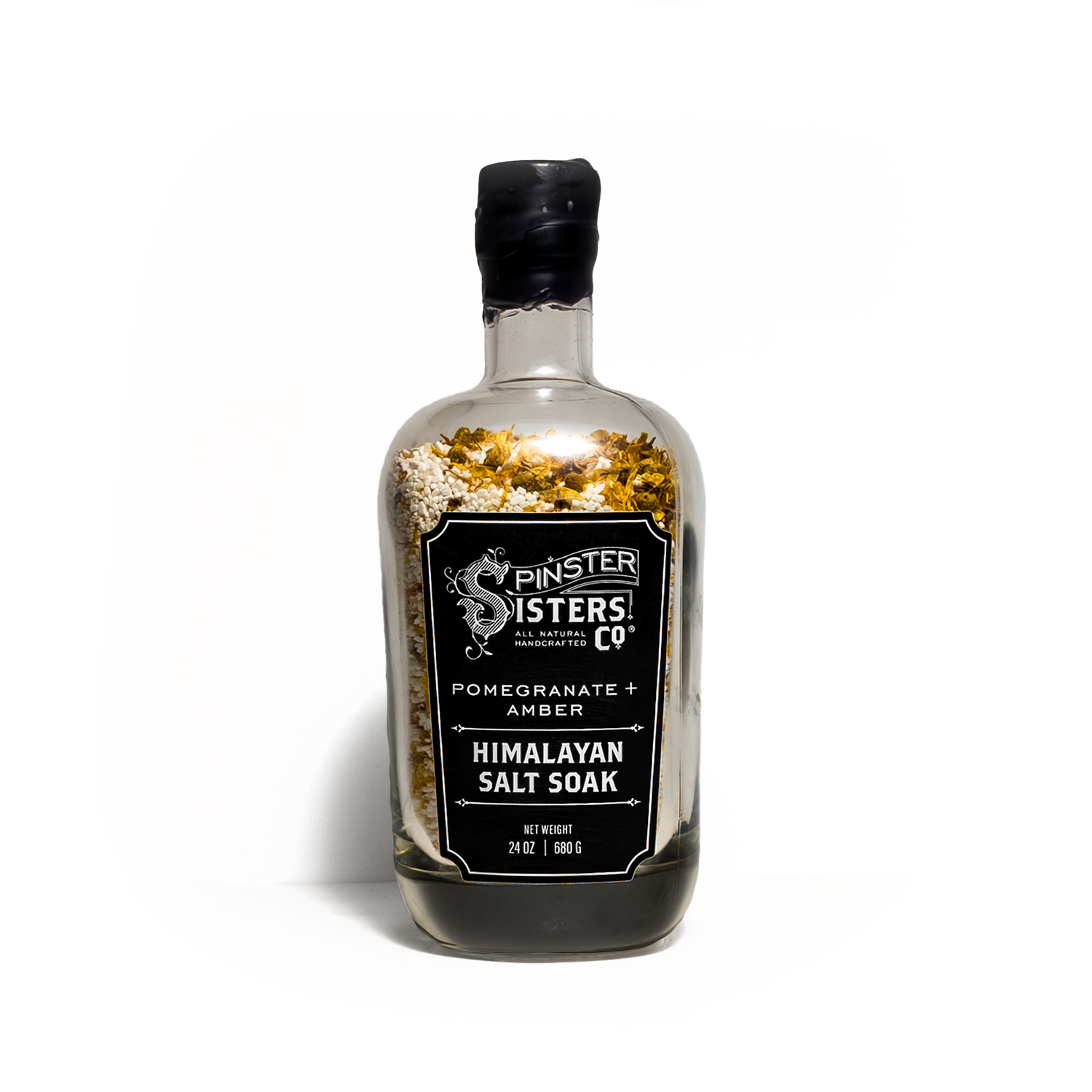 Bottle of Spinster Sisters Co. Pomegranate & Amber Himalayan Salt Soak on a white background