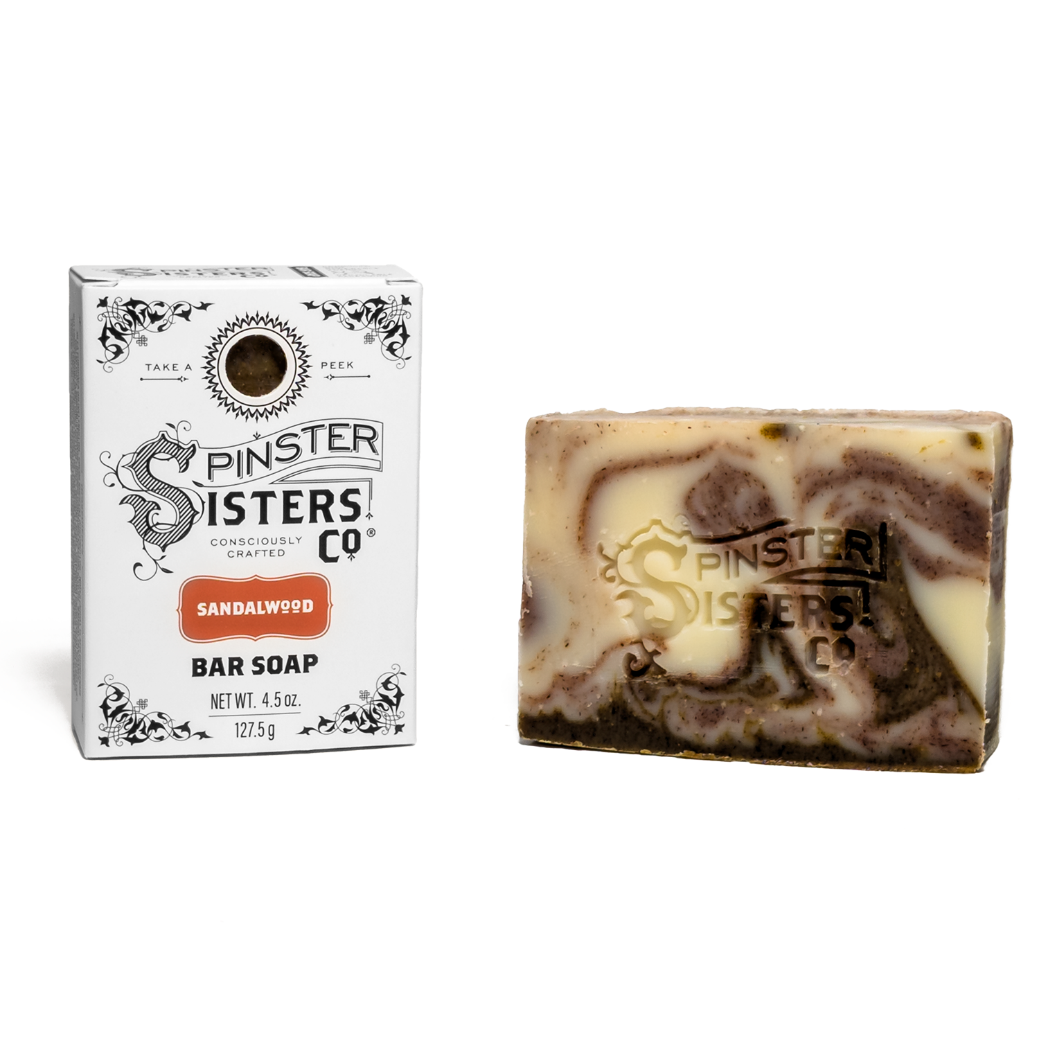 Sandalwood Bar soap with marbled design and packaging labeled 'Spinster Sisters Co' on a white background