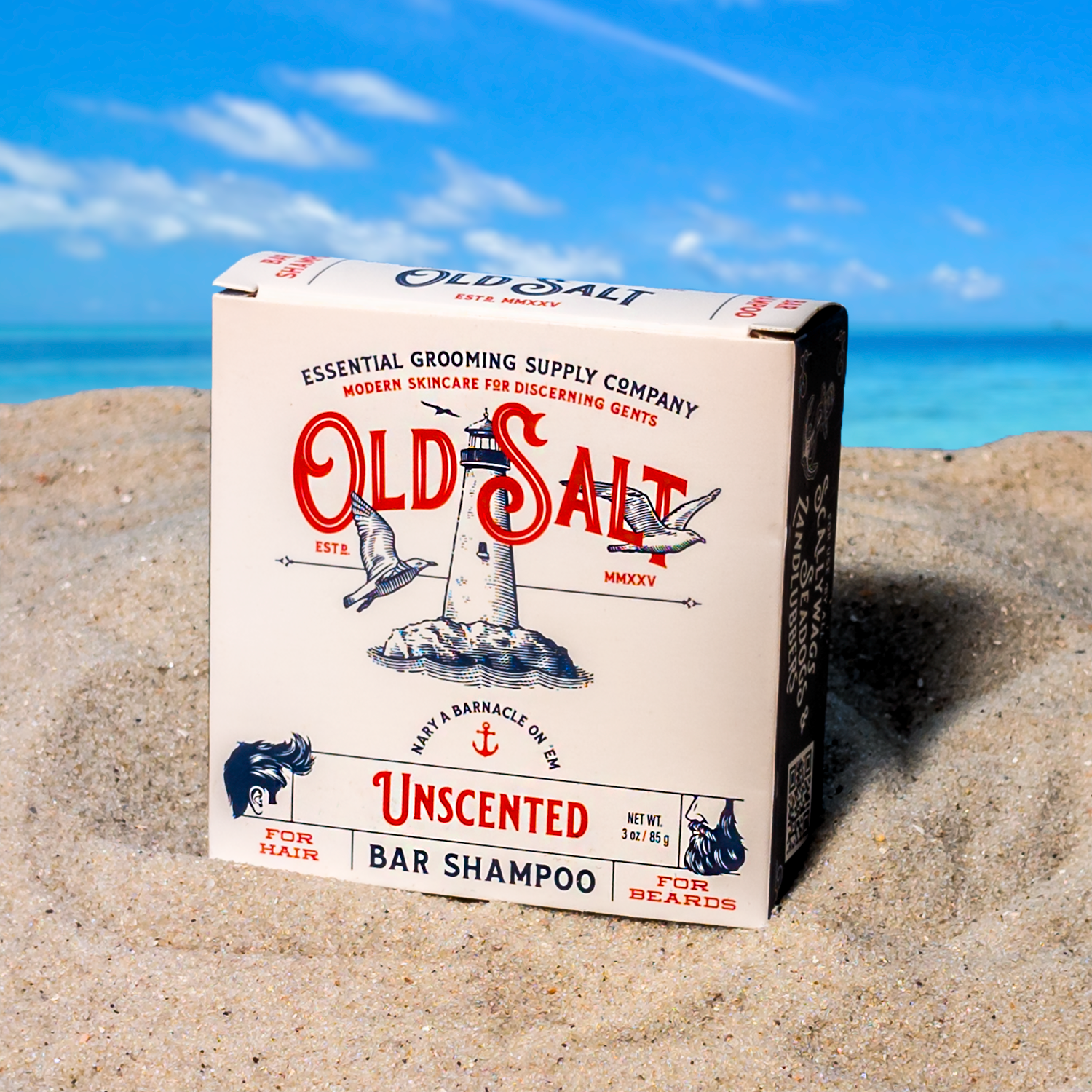 Box of Old Salt Unscented Shampoo Bar on a Sandy beach
