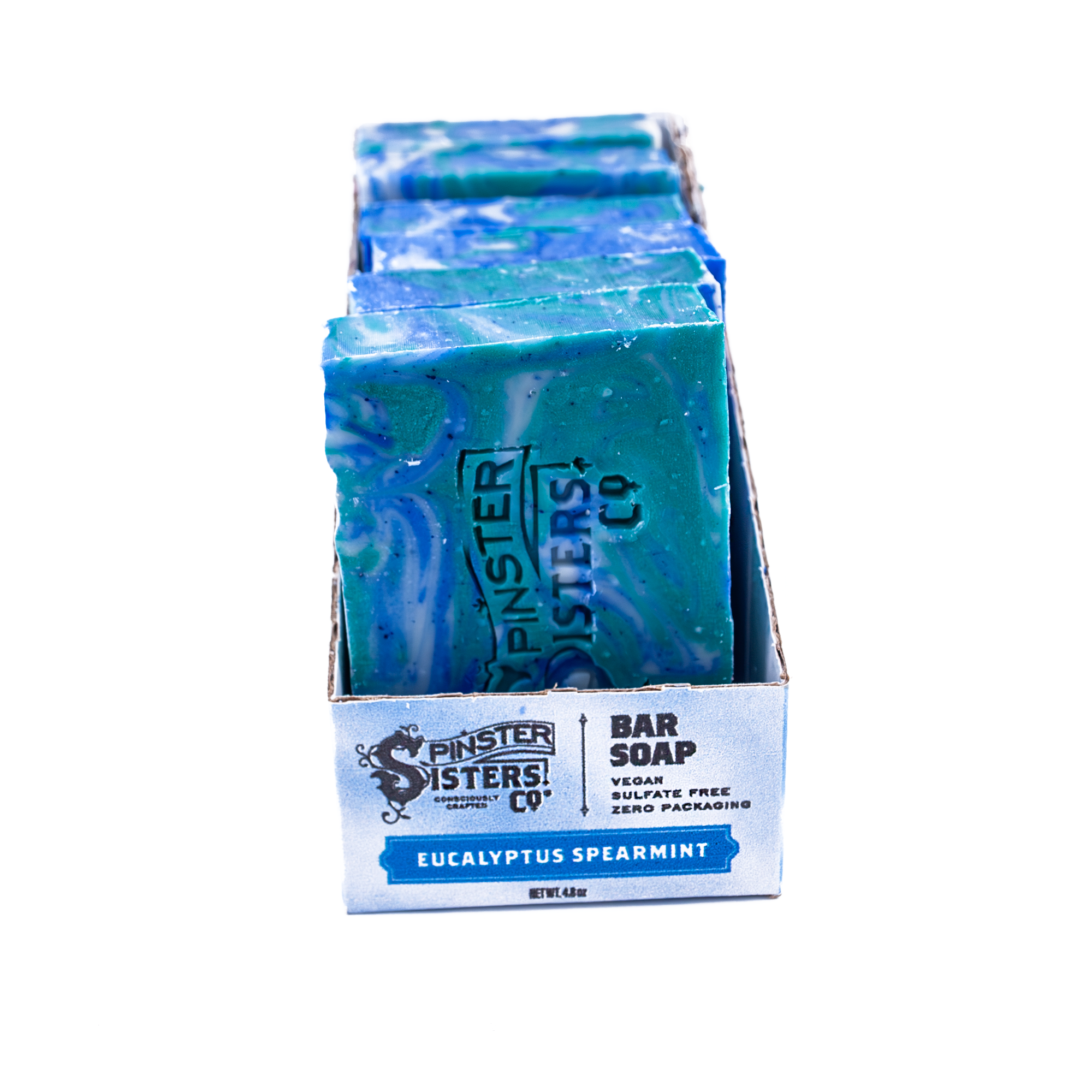 Case of blue swirled Eucalyptus Spearmint bar soaps with 'Spinster Sisters Co' branding on a white background