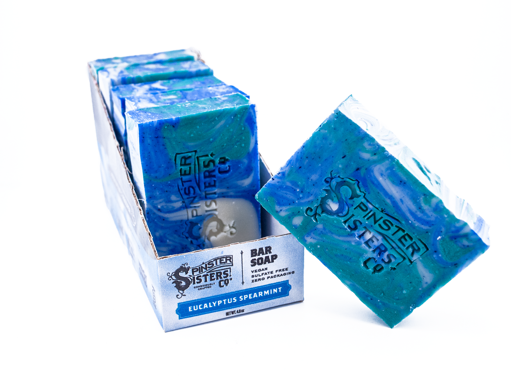 Case of Eucalyptus Spearmint bar soap with 'Spinster Sisters' branding in a clear packaging on a white background
