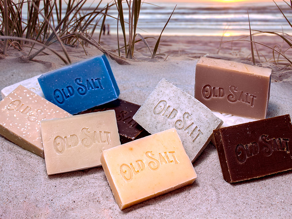 10 assorted Bars of soap on the beach, the words "Old Salt" Stamped on each bar