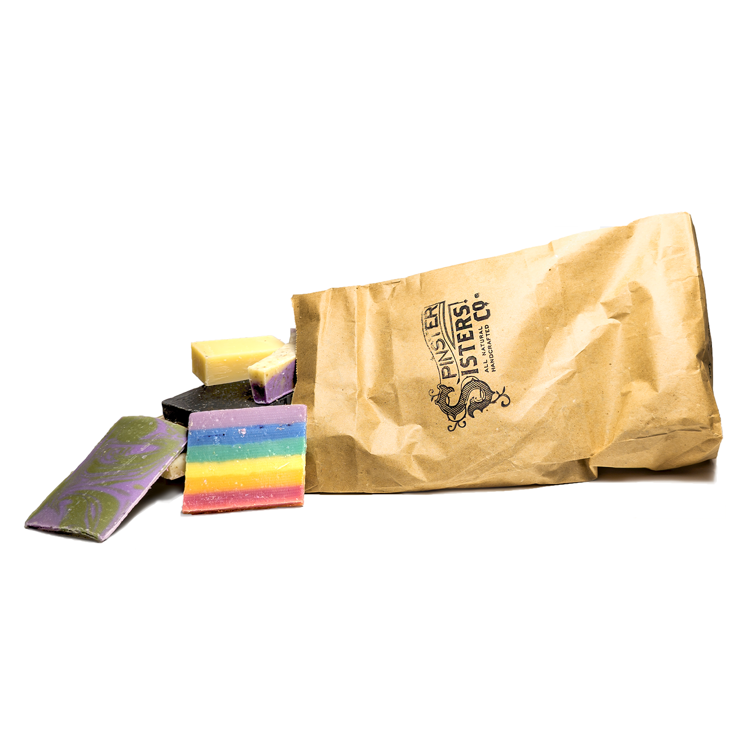 'Spinster Sisters co" stamped on a tipped over Brown paper bag with assorted soap ends spilling out