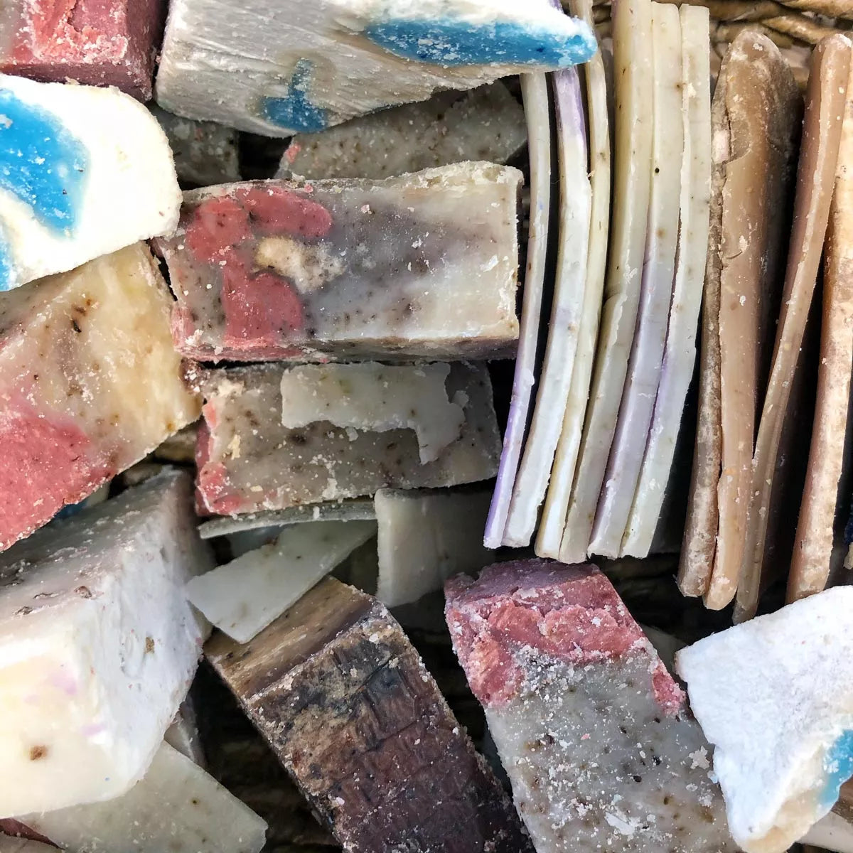 Pile of cut soap ends in assorted scents